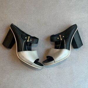 Naked feet leather black and gray open toe 3.5” heel shoes.